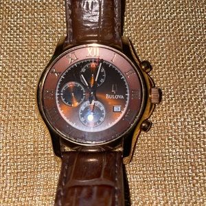 Bulova Gold and Brown Leather watch $50